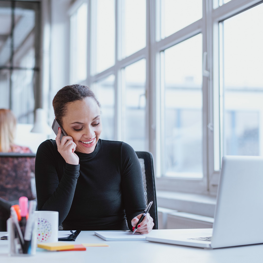 a woman on the phone in an office