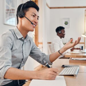 Person working in an office while using a headset