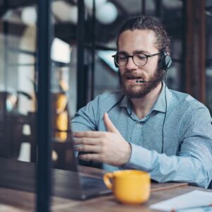 Person talking on the phone using a headset