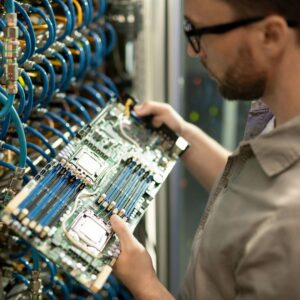 Person working on a cable panel