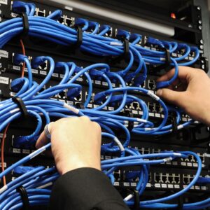 Person working with structured cabling